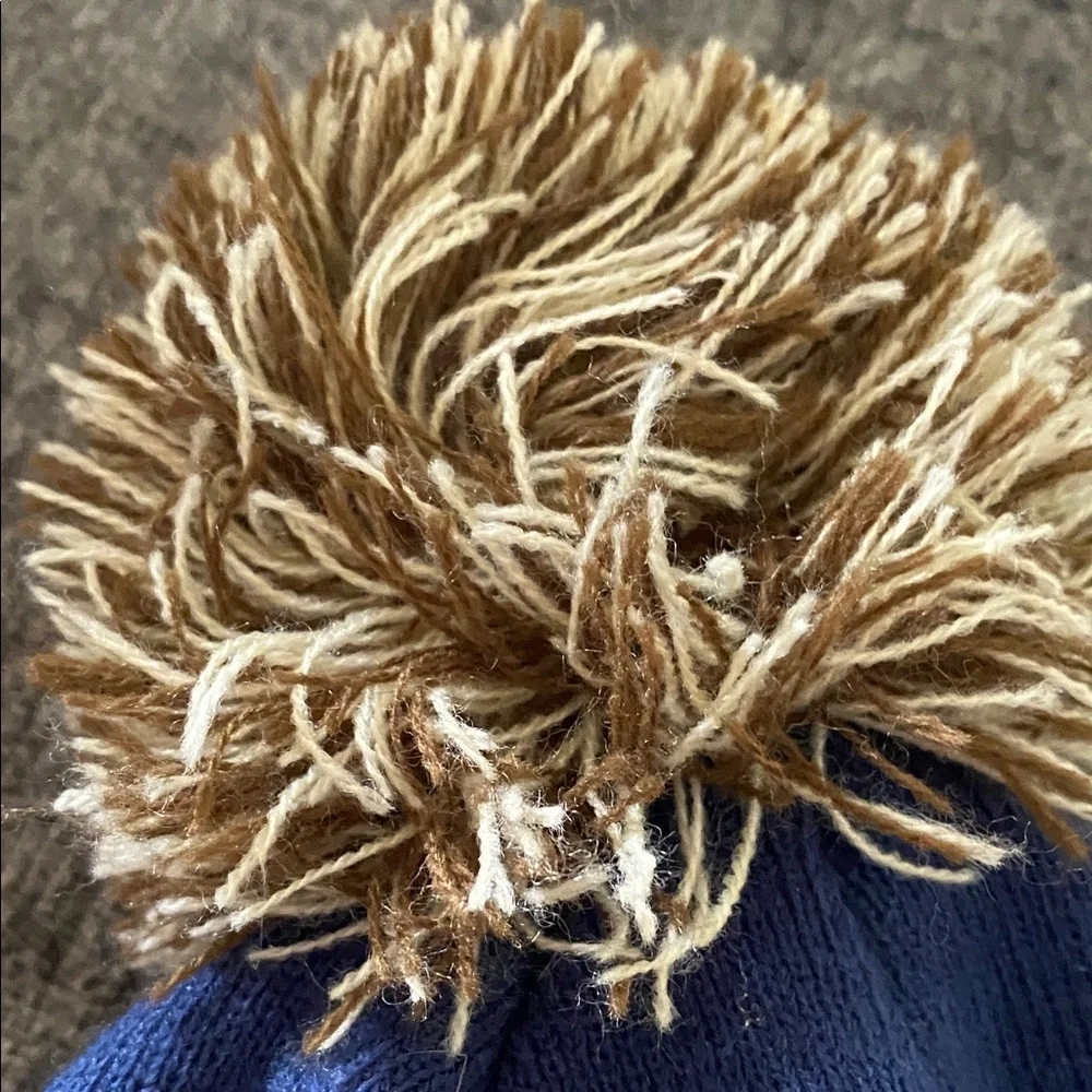 Cirque Blue and Tan Beanie with Colorado Patch. Designed in Vail, CO.
